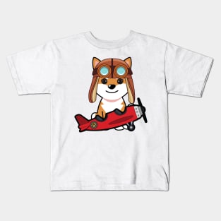 Cute orange dog is in a vintage airplane Kids T-Shirt